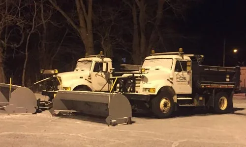 Two of our snow plows prepared to go out and clear our client's properties in Ashtabula.